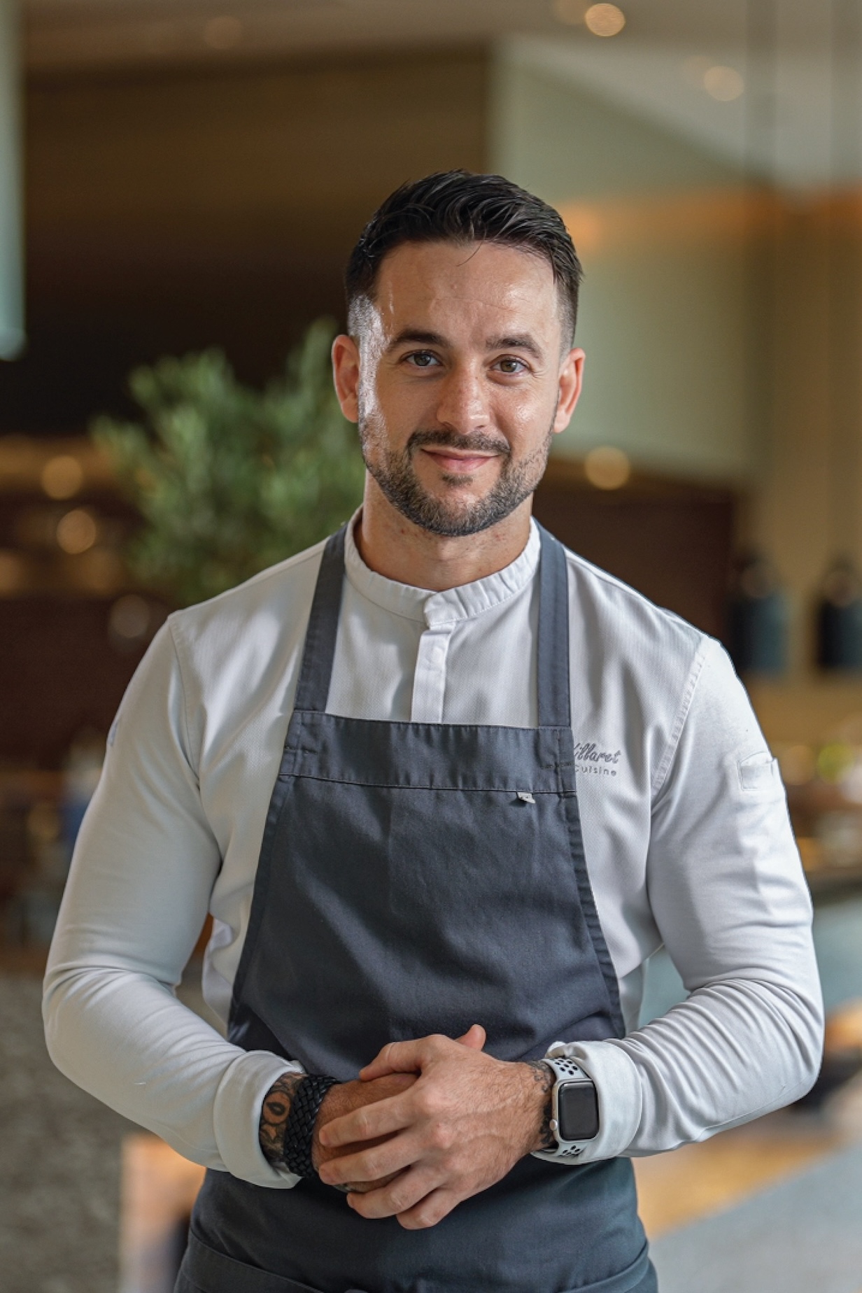 Chef plating a course